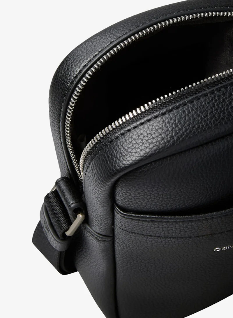 CALVIN KLEIN Raised Logo Plaque Slim Reporter Bag